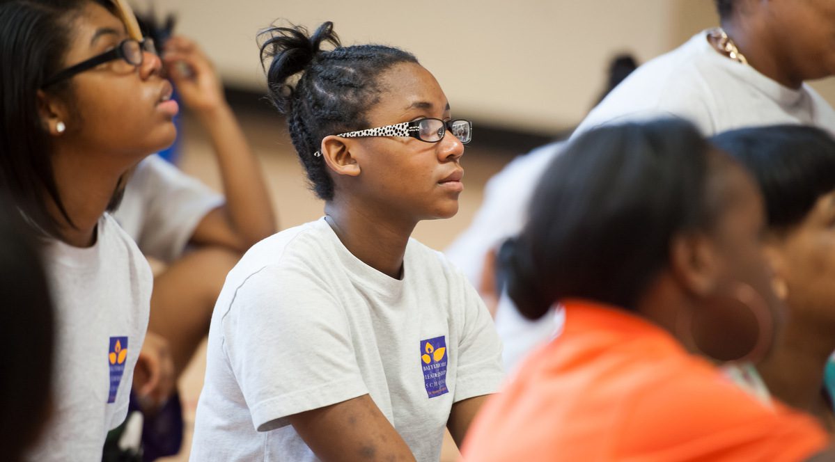 8044_9_1200_0_67 a group of people in a meet.